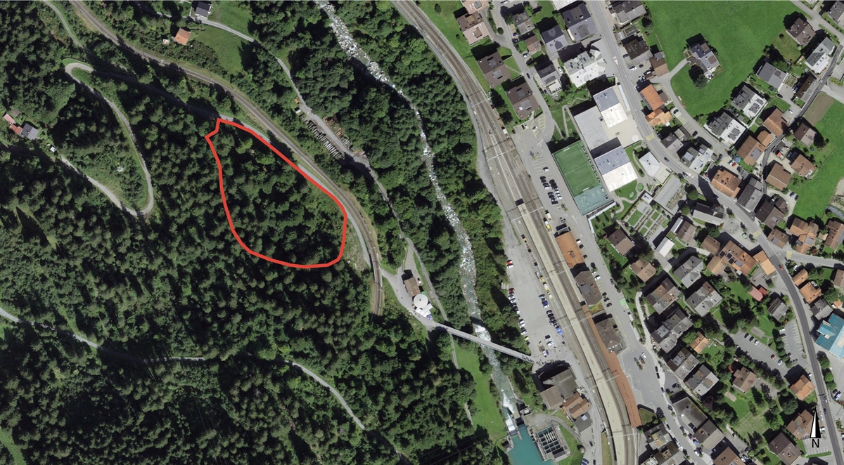 Luftaufnahme auf der das Gebiet des Trailcenters eingekreist ist